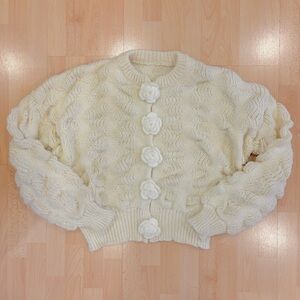 Cream knit cardigan with flower buttons